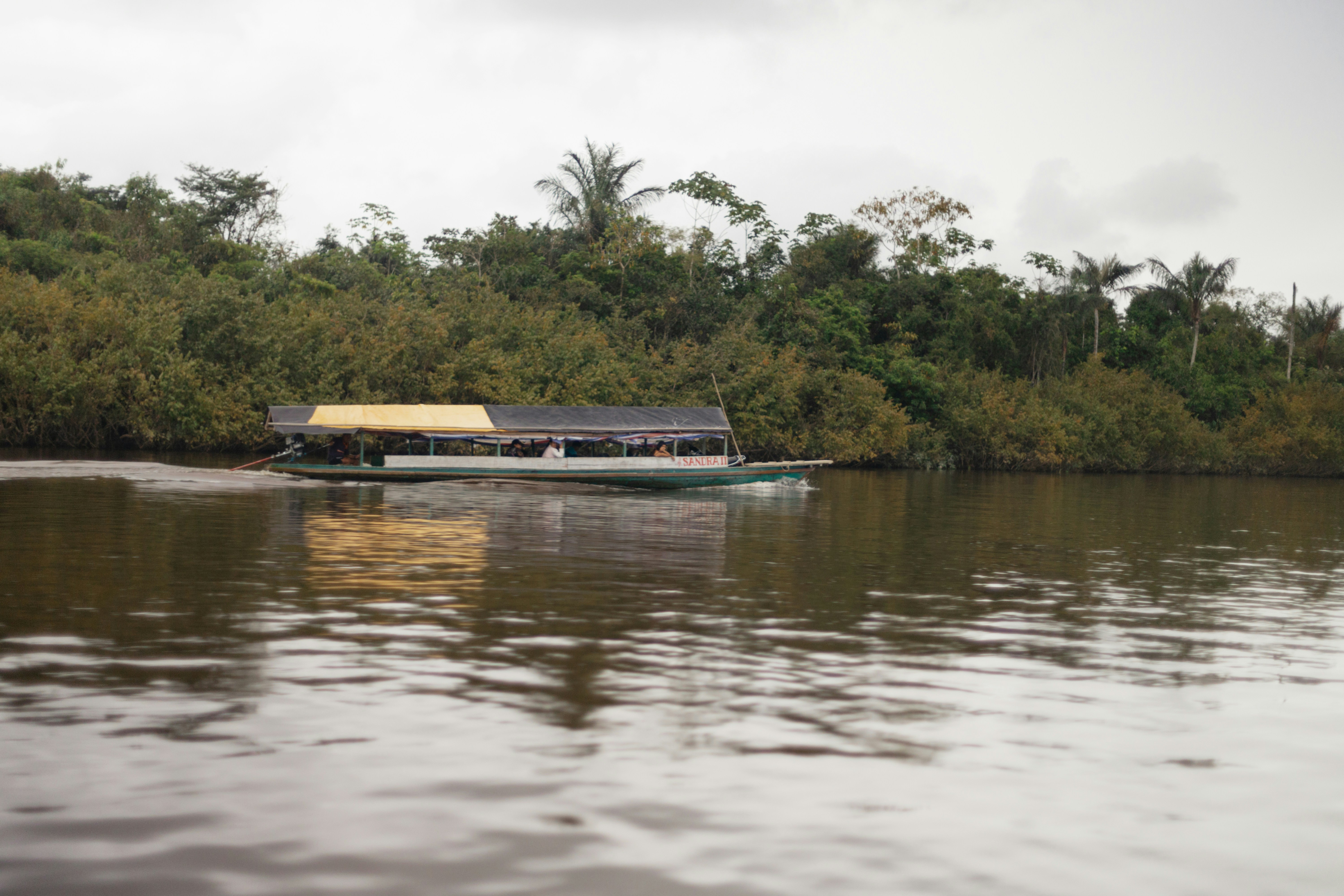 Boat Floating on the Amazon River